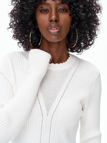 Blue Shadow Sweater in Beige: front