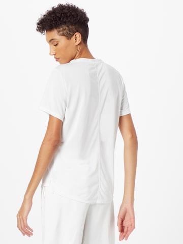 T-shirt fonctionnel NIKE en blanc