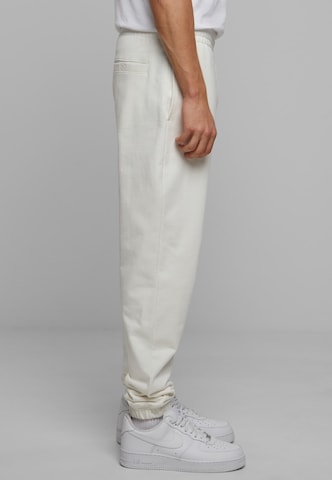 Tapered Pantaloni di Urban Classics in bianco