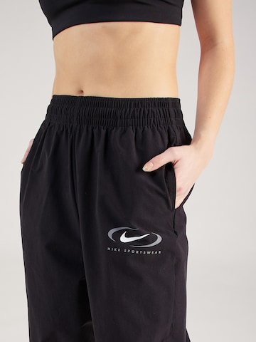 Nike Sportswear Дънки Tapered Leg Панталон в черно