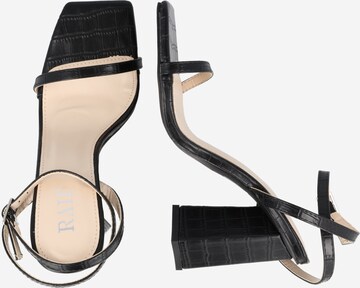 Raid Strap sandal in Black