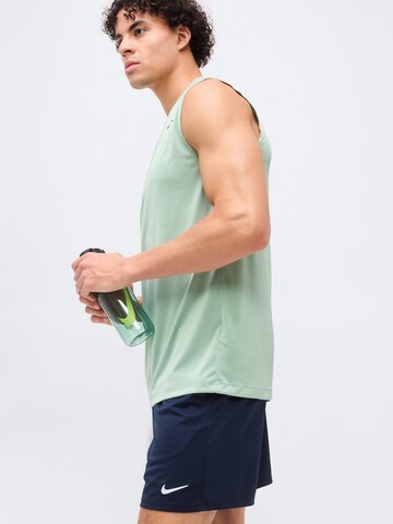 NIKE Regular Спортен панталон 'Flex' в синьо