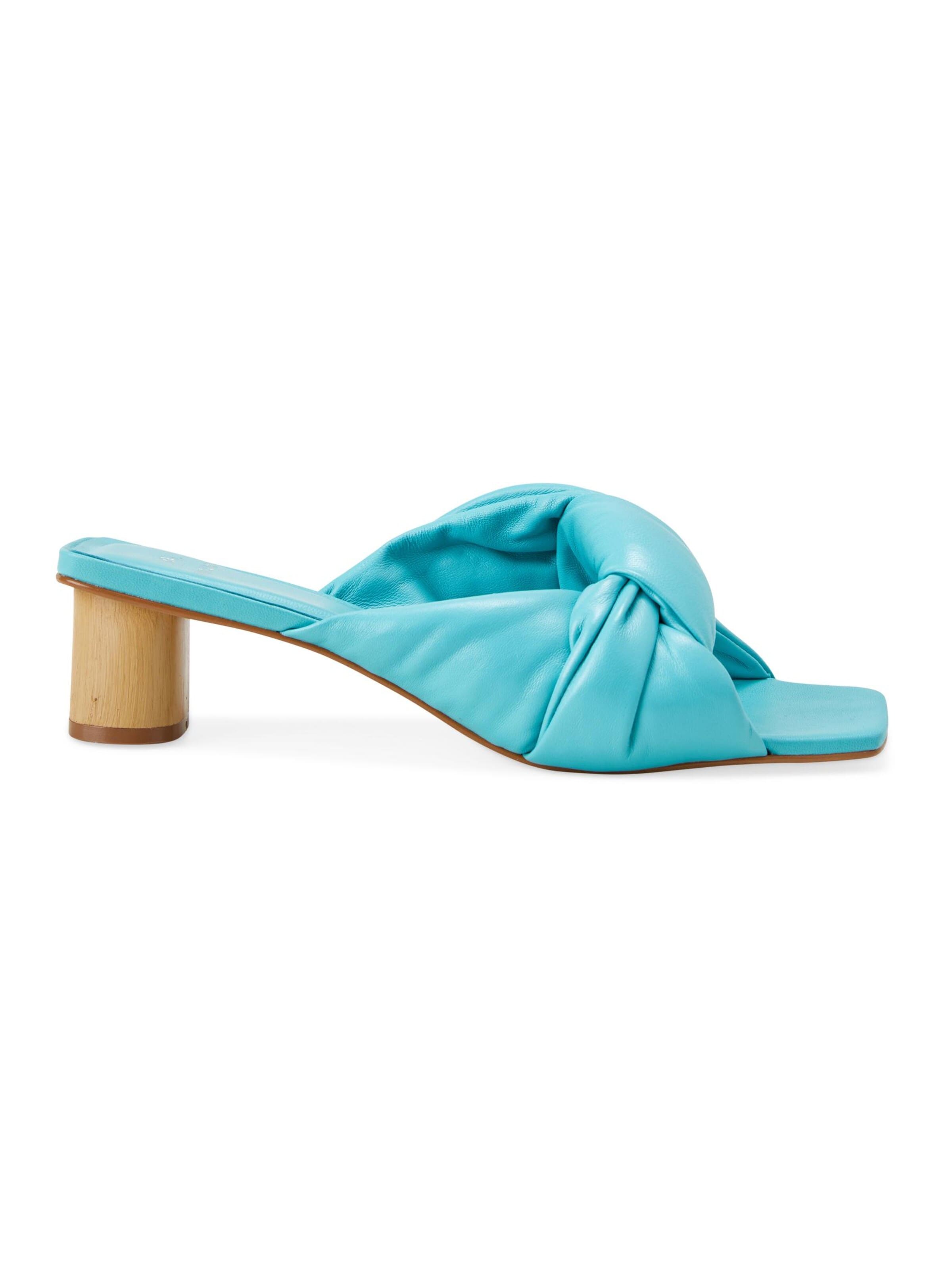Mangara Atelier Muiltjes 'Mule à Noeud en Cuir Caroba Mangara — Turquoise' in Blauw: voorkant