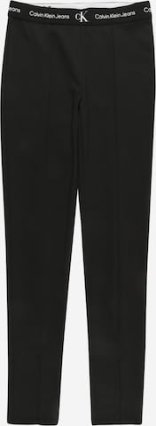 Pantaloni de la Calvin Klein Jeans pe negru: față