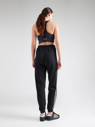 Effilé Pantalon ADIDAS ORIGINALS en noir