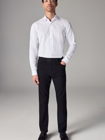 Next Úzky strih Džínsy 'Motion Flex' - Čierna