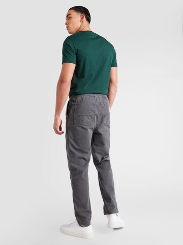 Carhartt WIP Loose fit Trousers 'Flint' in Grey