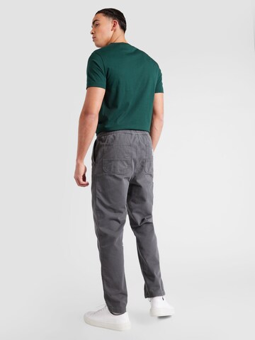 Carhartt WIP Loosefit Hose 'Flint' in Grau