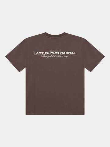 Last Bucks Koszulka 'Last Bucks | Capital Tee' w kolorze brązowy