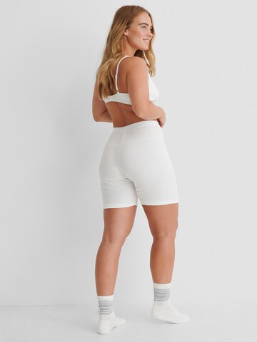 hunkemöller x NA-KD - Calças de pijama 'Zia' em branco