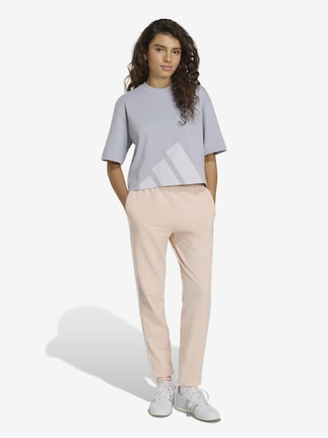 rožinė ADIDAS SPORTSWEAR Siaurėjantis Kelnės 'Essentials': priekis