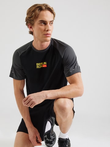 NIKE Функциональная футболка 'CITY' в Черный: спереди