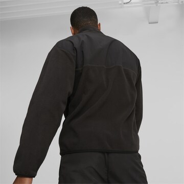 PUMA Pullover in Schwarz