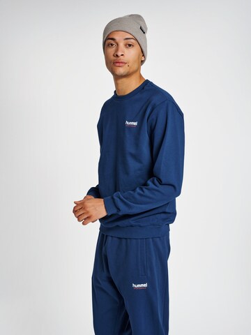 Hummel Sportsweatshirt 'Austin' in Blauw: voorkant