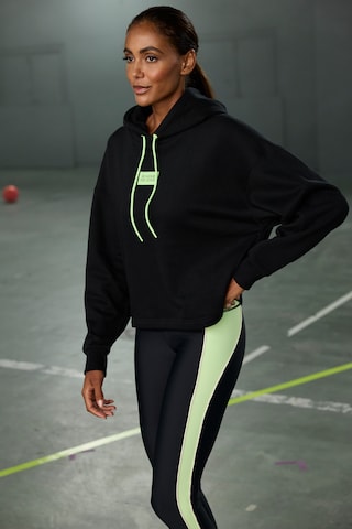 Sweat-shirt LASCANA ACTIVE en noir : devant