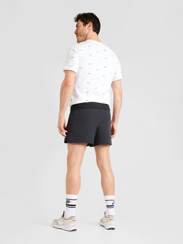 NIKE Regular Sportbroek 'FLX REP 4.0' in Zwart