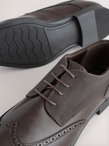 Next Čevlji na vezalke | rjava barva