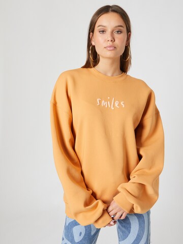 SmilesSweater majica 'Milo' - narančasta boja