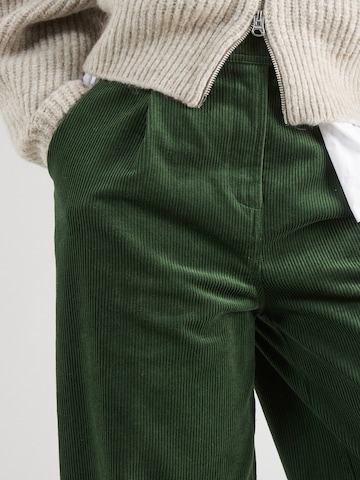 TOPSHOP - Loosefit Pantalón plisado en verde