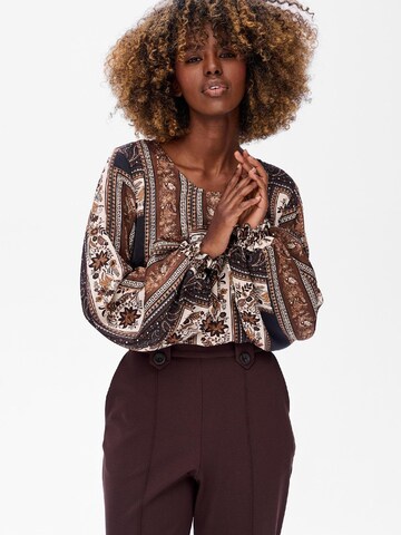 Blue Shadow Blouse in Brown: front