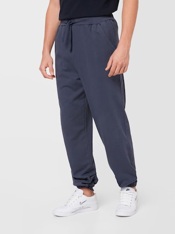 ABOUT YOU Limited Loose fit Pants 'Luis' by Jannik Stutzenberger' in Blue: front