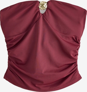 Next Toppi värissä punainen: etupuoli