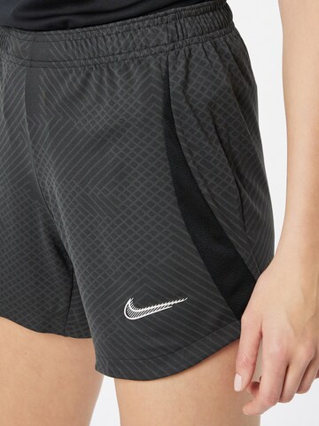 NIKE - Regular Calças de desporto em cinzento