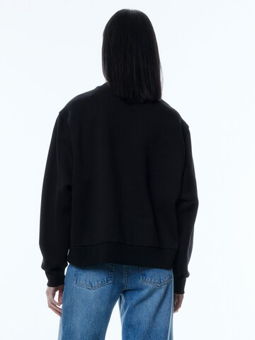 EDITED Sweatshirt 'Valda' in Schwarz