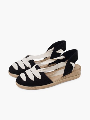 Pisamonas - Sandalias en negro
