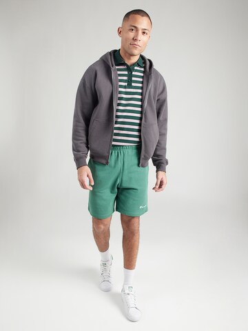 Largi Pantaloni de la Champion Authentic Athletic Apparel pe verde