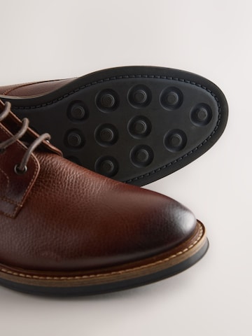 Next - Botas con cordones en marrón