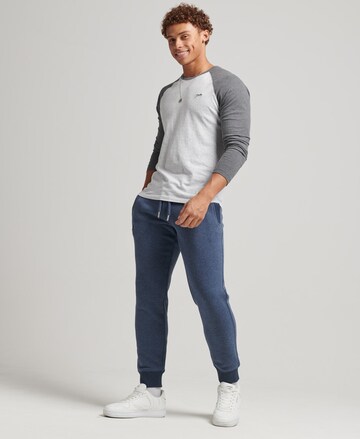 Superdry Tapered Broek in Blauw