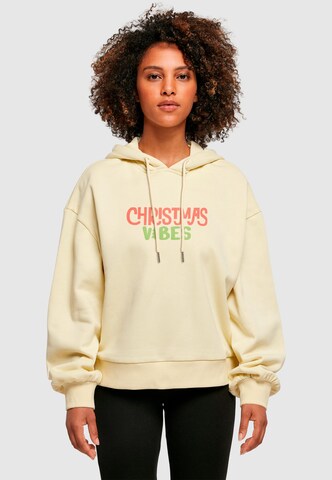 Merchcode Sweatshirt 'Christmas Vibes' in Geel: voorkant