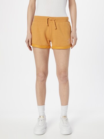 RIP CURL Regular Workout Pants in Gold: front