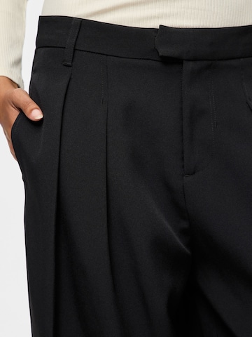 Baggy Pantalon à pince 'BARREL' PIECES en noir