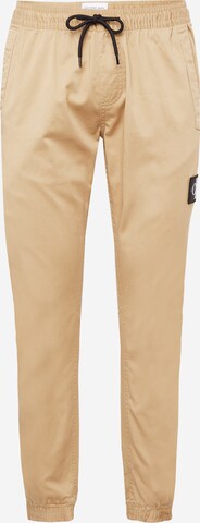 Effilé Pantalon chino Calvin Klein Jeans en beige : devant