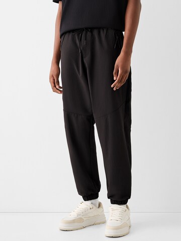 Bershka Zúžený Kalhoty – černá