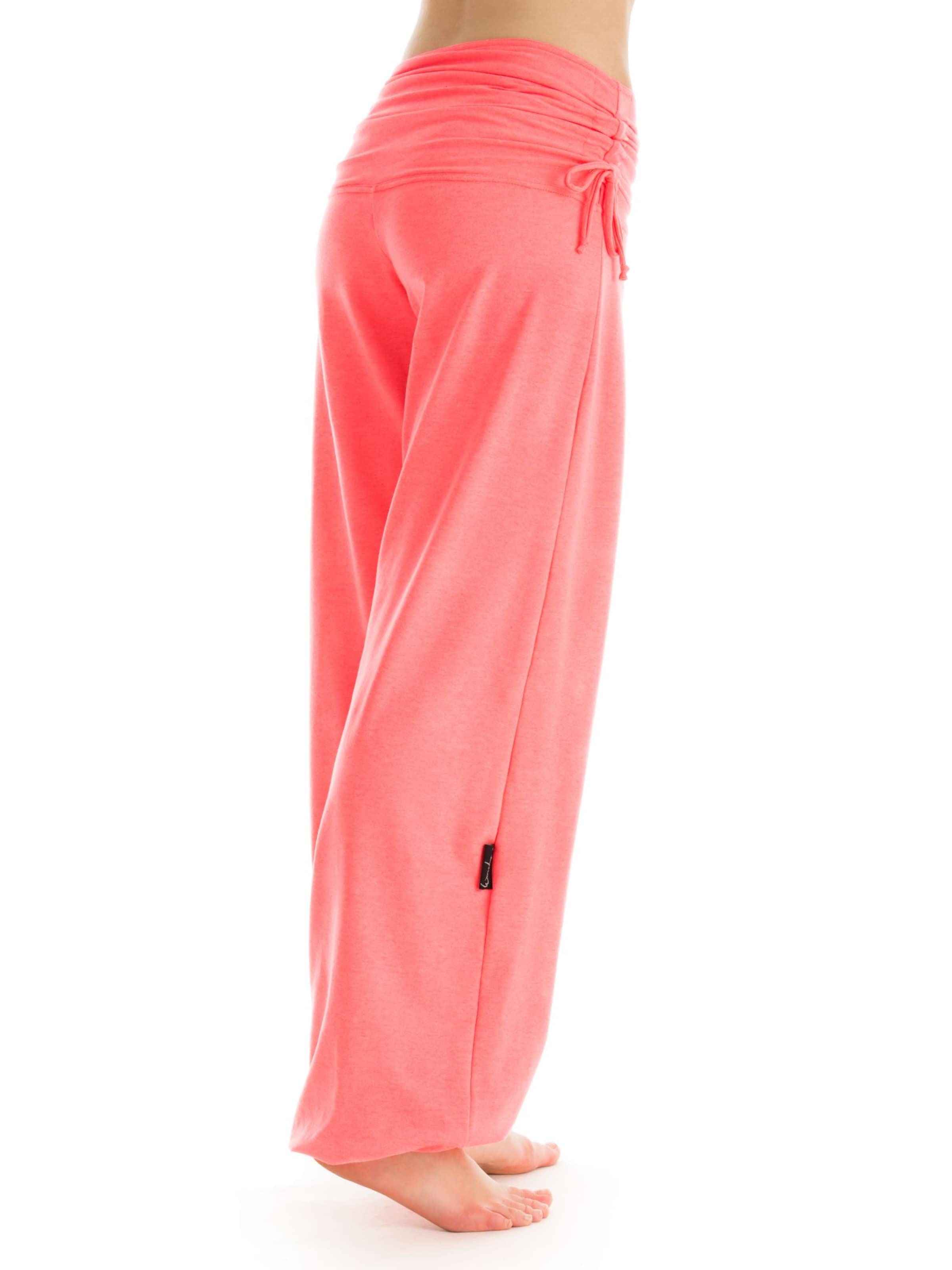 Winshape Дънки Tapered Leg Спортен панталон 'WH1' в оранжево