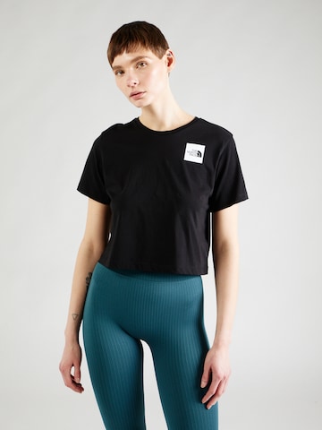 THE NORTH FACE T-shirt i svart: framsida