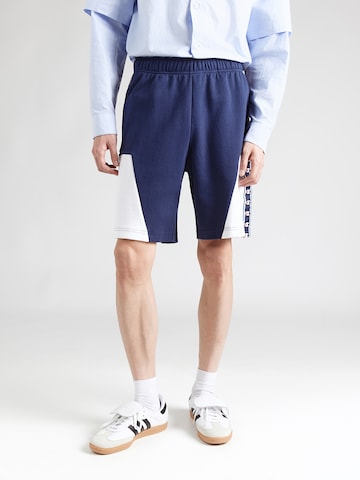 Champion Authentic Athletic Apparel Loosefit Nadrág - kék: elől
