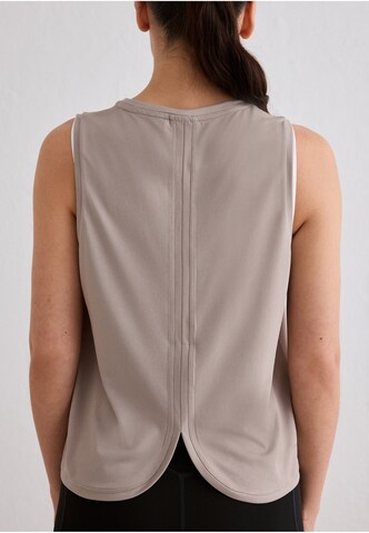 Haut de sport Aim'n en marron