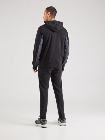Tuta da jogging di Champion Authentic Athletic Apparel in nero