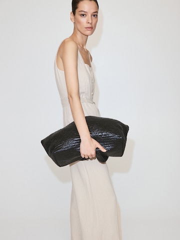 Tuta jumpsuit di MANGO in beige: frontale