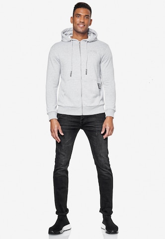 Rusty Neal Zip-Up Hoodie in Grey