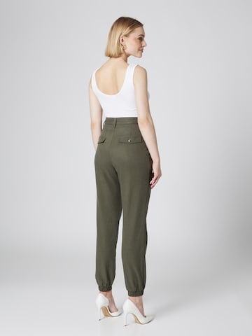 Guido Maria Kretschmer Women Tapered Pleat-front trousers 'Nicola' in Green: back