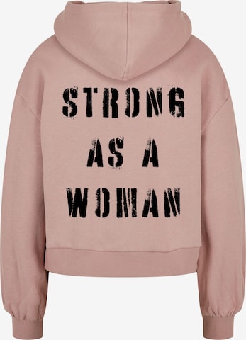 Sweat-shirt 'WD - Strong As A Woman' Merchcode en rose