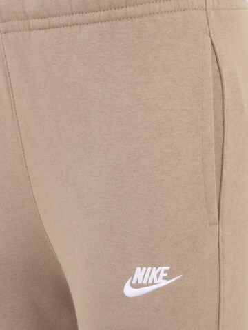 Nike Sportswear Tapered Housut 'Club Fleece' värissä vihreä