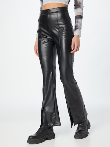 Trendyol Flared Trousers in Black: front