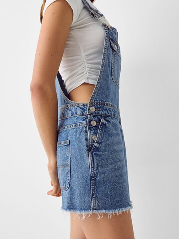 Bershka Dungaree skirt in Blue