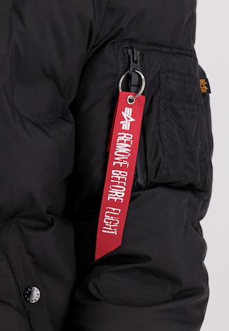 ALPHA INDUSTRIES Übergangsjacke 'Flight Jacket Hooded Logo Puffer Wmn' in Schwarz